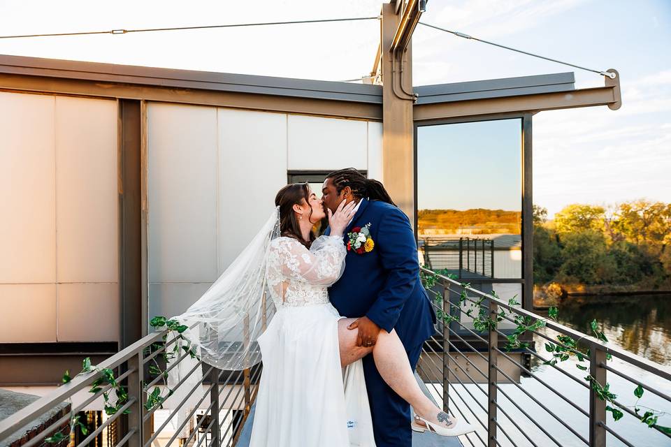 Couple kissing at sunset
