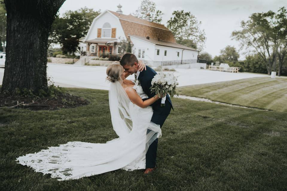 Couple in front of the barn