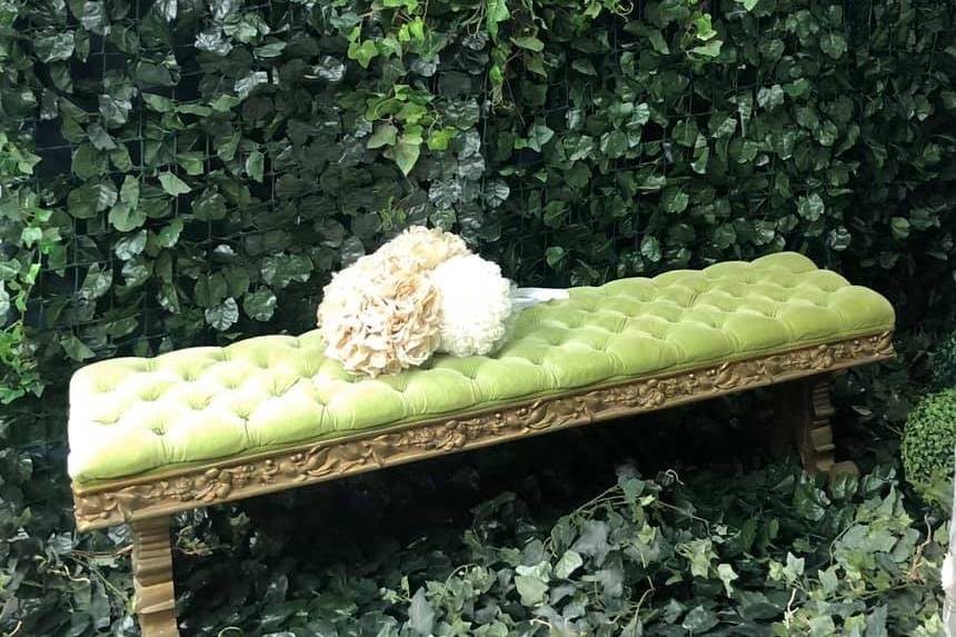 Bench and greenery decor