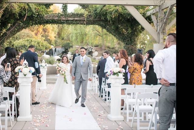 LexiLou Special Events planned and decorated the ceremony pillars for this wonderful couple.