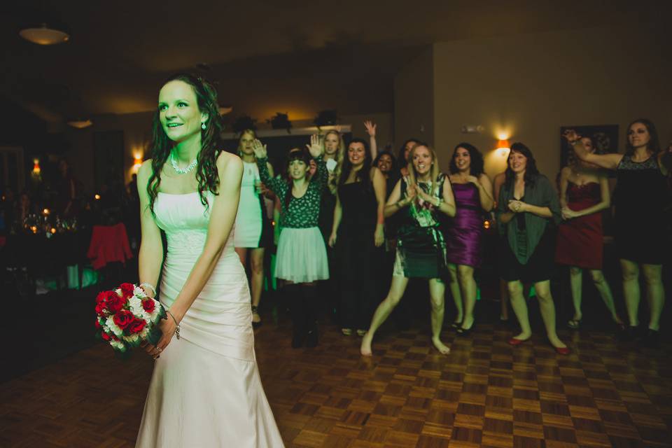 Bride tossing her bouquet