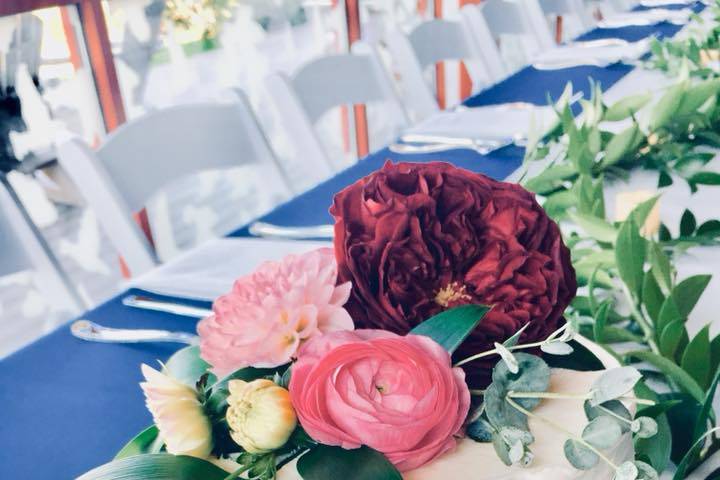 Cascading floral cutting cake