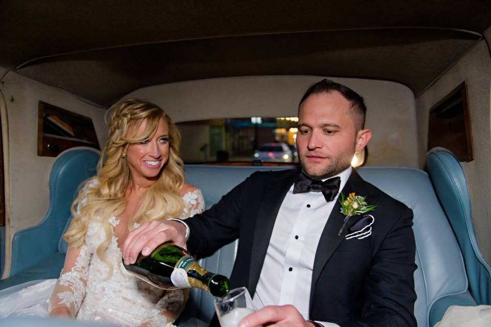 Happy couple in a stylish vehicle