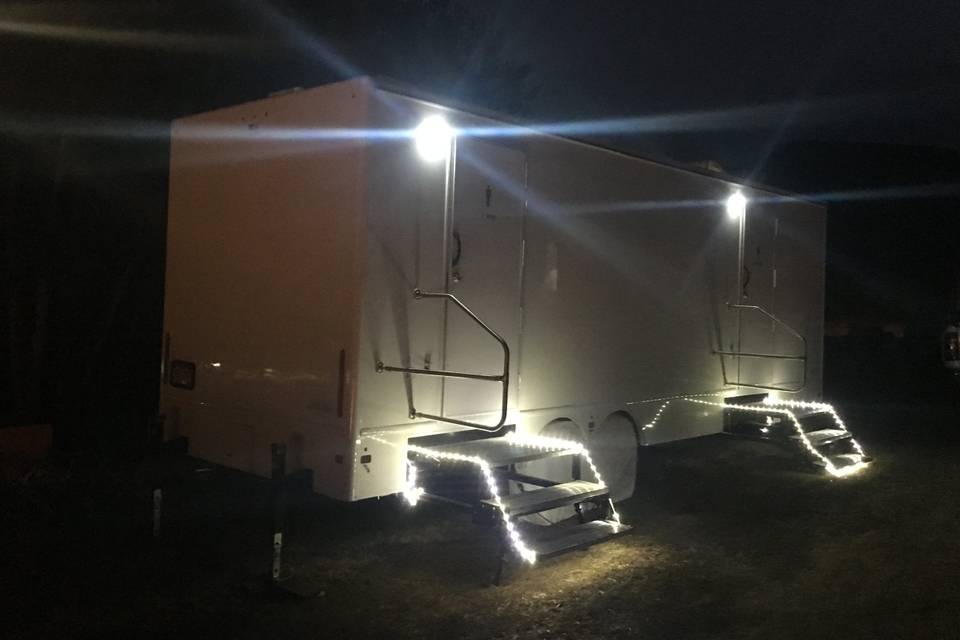 Portable luxury restroom at night