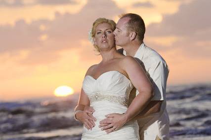 Sunset Bride and Groom alone On Oahu's famous North Shore for a trash the dress session