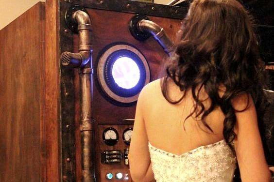 A bride looking over her photos at Union Horse Distillery in Lenexa, Kansas.