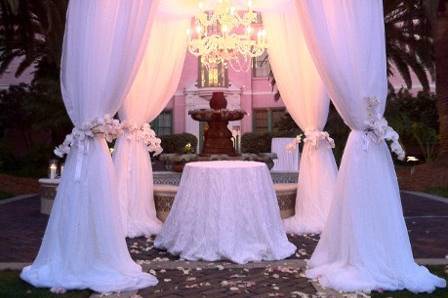 Sheer white wedding arch