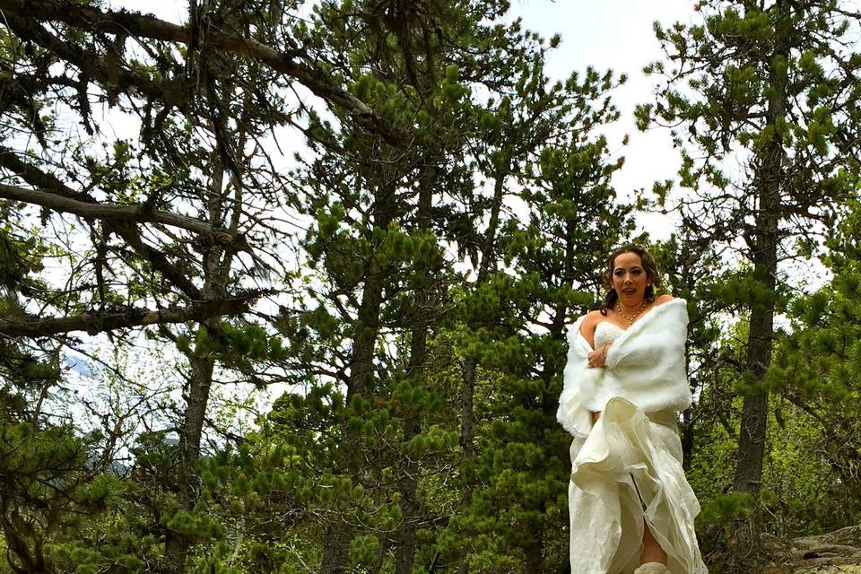 Beautiful trail to the scenic overlook, a rocky place above the bay, with snow capped mountains in the background.Photo by Becky McGill Mull of Azure Alaska Weddings.