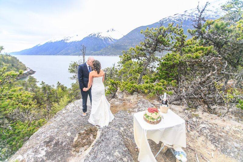 She finds her man, waiting for her on the rock.Photo by Shannon McGuire of Chugach Peaks Photography.