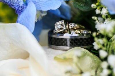 Wedding rings look pretty nestled into the Bride's flower bouquet.Photo by Shannon McGuire of Chugach Peaks Photography.