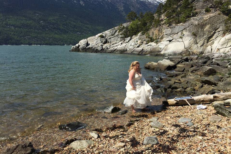 Barefootin it in the bay.Photo by Becky McGill Mull of Azure Alaska Weddings.
