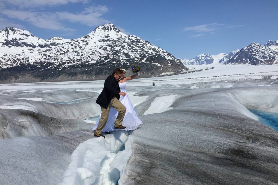 Taking the leap of faith... into marriage.Photo by Becky McGill Mull of Azure Alaska Weddings.