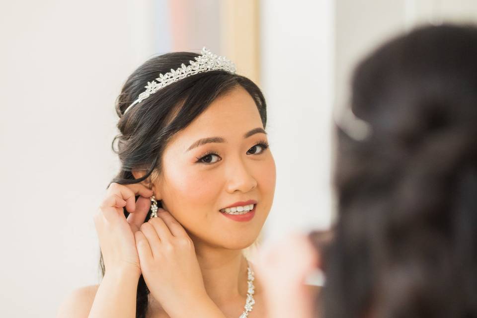 Bride in front of mirror