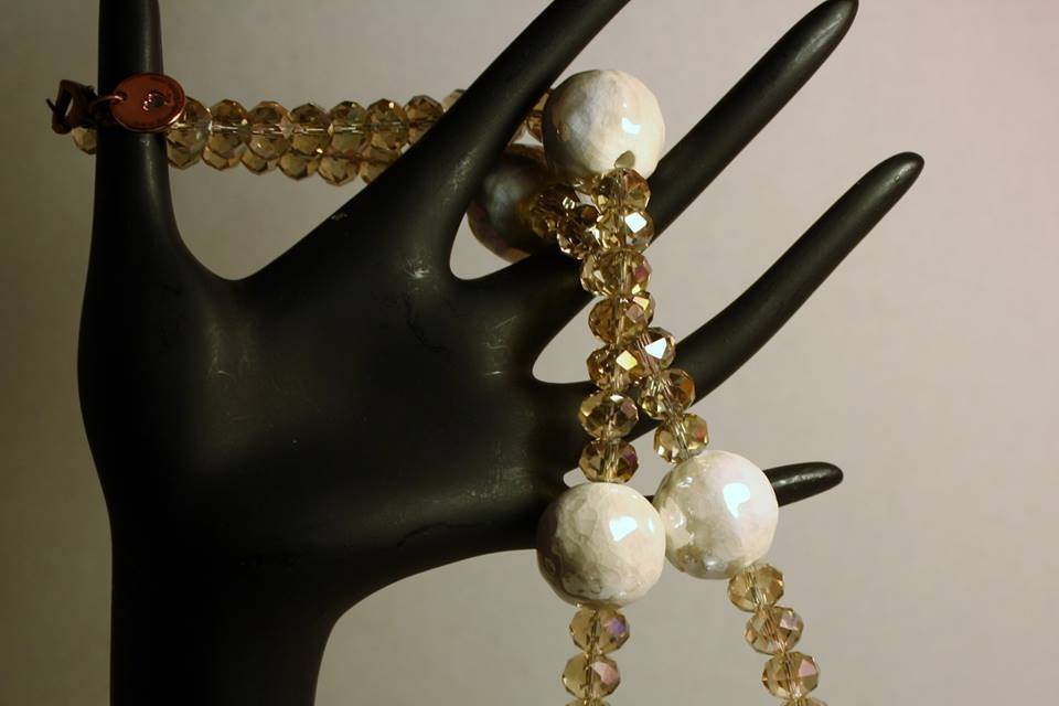Custom design with unique combination with golden shadow amber round faceted glass crystals with chunky white ceramic cream colored ceramic beaded, necklace, earrings and bracelet for the Bride or bridal party in any style and length,at affordable prices. All Renee needs is YOUR wedding colors
