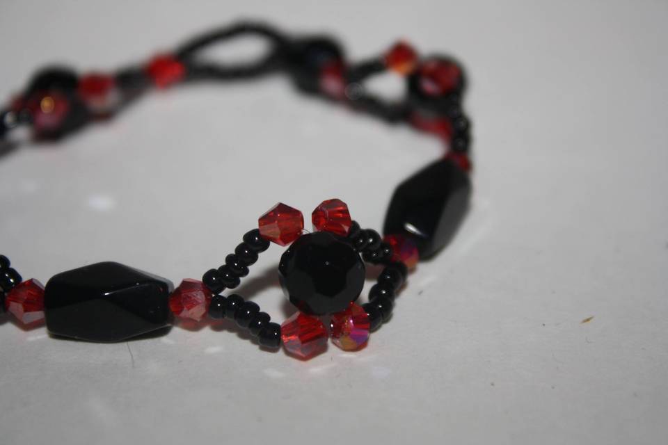 Custom design with unique combination of varying sizes of black twisted rectangles, round black  faceted beads with red faceted bi-cone crystal beaded choker necklace, earrings and bracelet for the Bride or bridal party in any style and length,at affordable prices. All Renee needs is YOUR wedding colors.