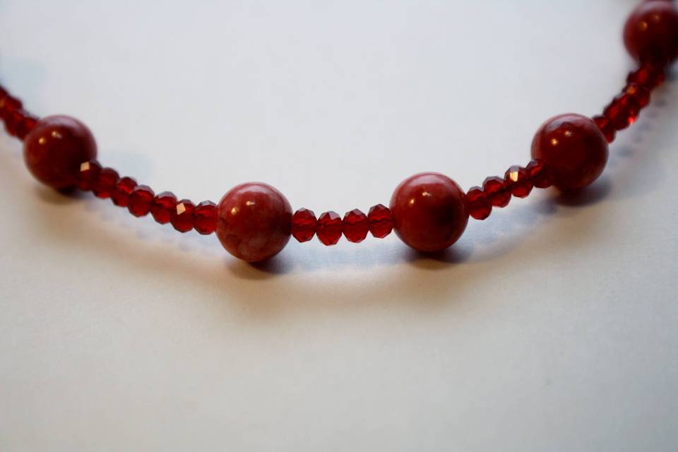 Custom design with unique combination of varying sizes of round faceted red glass crystals and beads in a beautiful  beaded necklace, earrings and bracelet for the Bride or bridal party in any style and length, at affordable prices. All Renee needs is YOUR wedding colors.