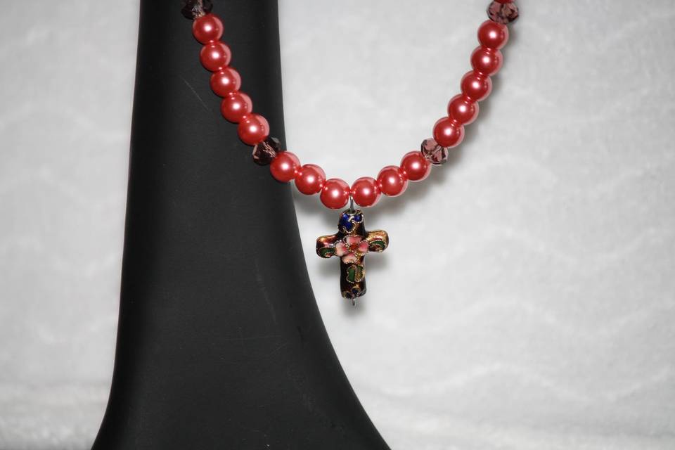 Custom design with unique combination mauve glass pearls and dark mauve transparent faceted Swarovski Crystal with Cloisonne' Cross in a beautiful beaded necklace, earrings and bracelet for the Bride or bridal party in any style and length,at affordable prices. All Renee needs is YOUR wedding colors.