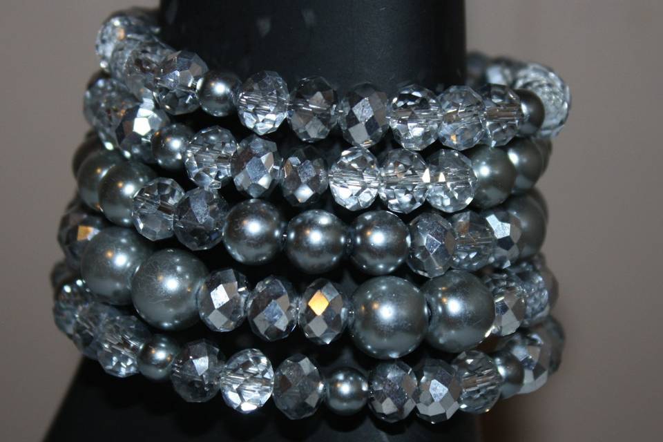Custom design with unique combination of varying sizes of round faceted half clear, half silver glass crystals with gray glass pearls in a beaded necklace, earrings and bracelet for the Bride or bridal party in any style and length,at affordable prices. All Renee needs is YOUR wedding colors.