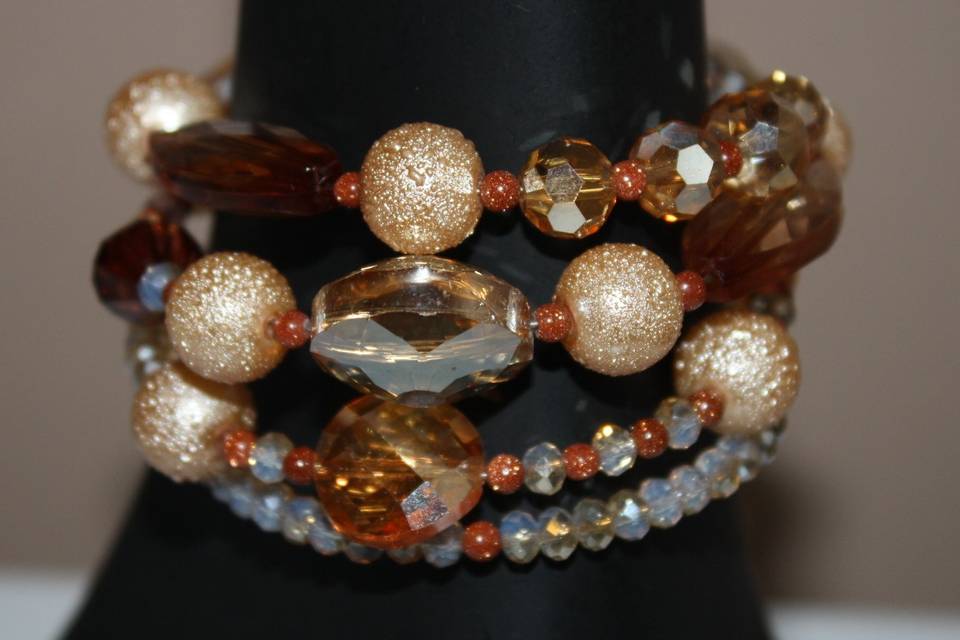 Custom design with unique combination of varying sizes of round faceted amber glass crystals and textured beige beaded bracelet for the Bride or bridal party in any style and length,at affordable prices. All Renee needs is YOUR wedding colors.