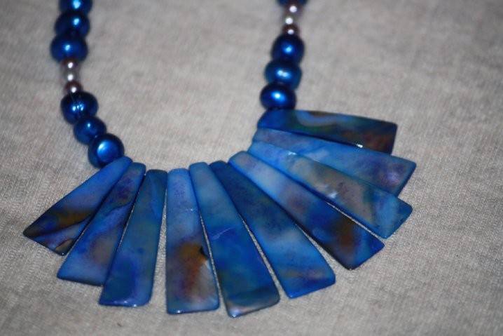 Custom design with unique combination of varying sizes of round navy and grayish blue Fresh Water Pearls with Mother of Pearl fan as a beautiful beaded necklace, earrings and bracelet for the Bride or bridal party in any style and length,at affordable prices. All Renee needs is YOUR wedding colors.