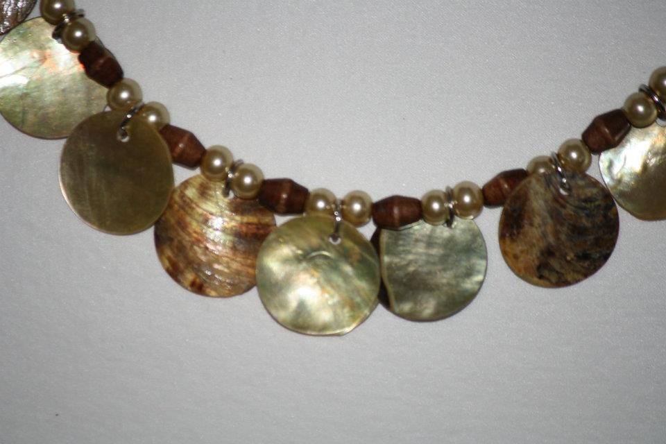 Custom design with unique combination of golden brown rough shell Mother of Pearl flat coin drops with beige glass pearls and wooden beads, in a beautiful rustic style necklace, earrings and bracelet for the Bride or bridal party in any style and length,at affordable prices. All Renee needs is YOUR wedding colors.