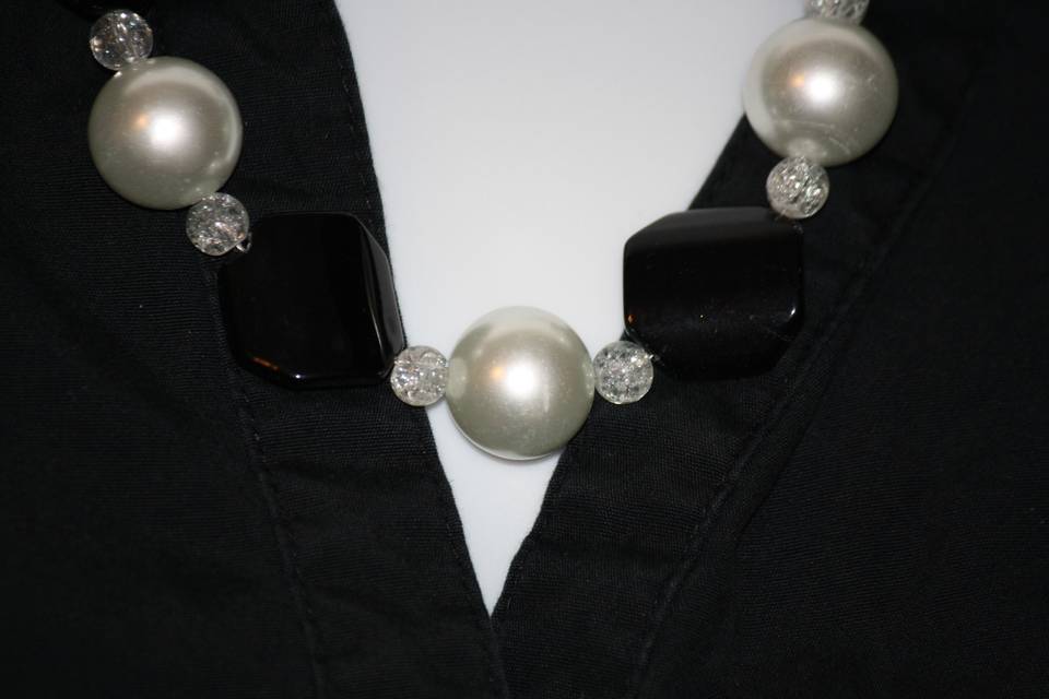 Custom design with unique combination of varying sizes of round faceted white glass crystals chunky white glass pearls with twisted black glass rectangles in a beautiful  beaded necklace, earrings and bracelet for the Bride or bridal party in any style and length,at affordable prices. All Renee needs is YOUR wedding colors.