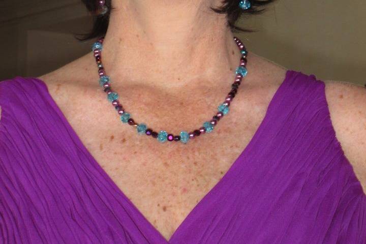 Custom design with unique combination of varying sizes of round faceted purple and blue glass crystals with lavender pearls for beautiful beaded necklace, earrings and bracelet for the Bride or bridal party in any style and length,at affordable prices. All Renee needs is YOUR wedding colors.