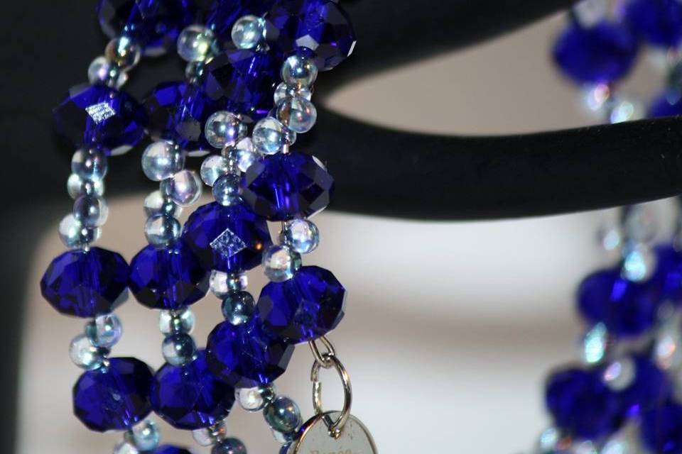 Custom design with unique combination of varying sizes of round faceted navy blue and clear glass crystals  for beautiful beaded necklace, earrings and bracelet for the Bride or bridal party in any style and length,at affordable prices. All Renee needs is YOUR wedding colors.