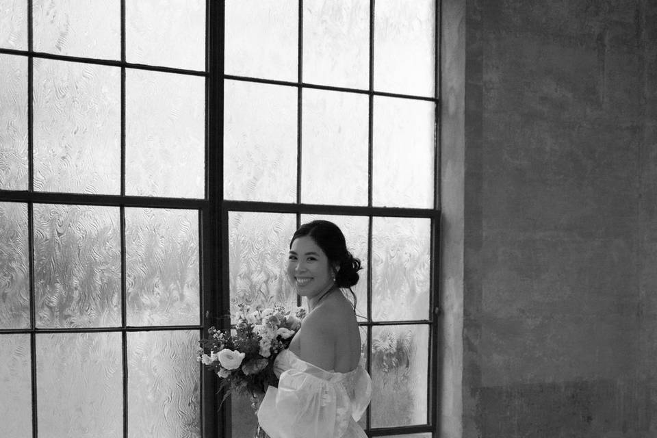 Bride by window