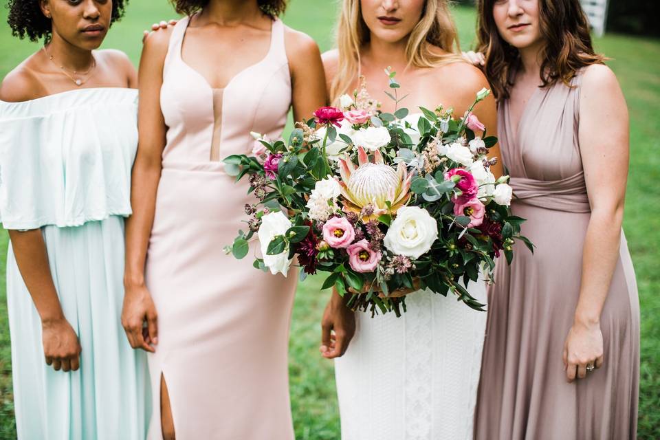 Wedding party standing outside