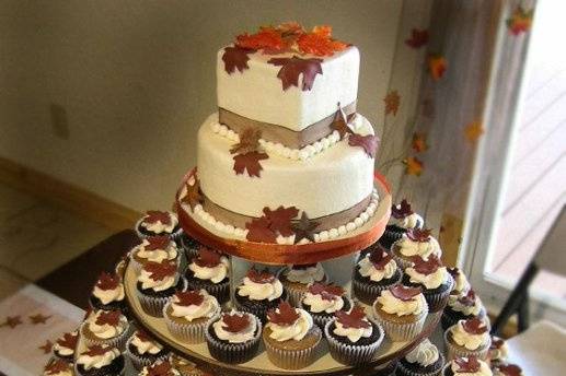 Fall Themed Wedding CupCake Tower with edible leaves.