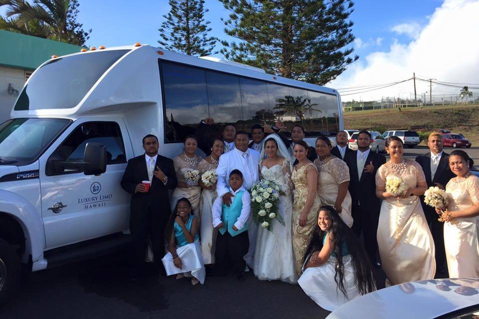Glitz, glamour, and gold!  The 25-passenger limobus has enough room for your entire wedding party and family members to ride from the ceremony to your reception. Let Luxury Limo Hawaii take you there!
