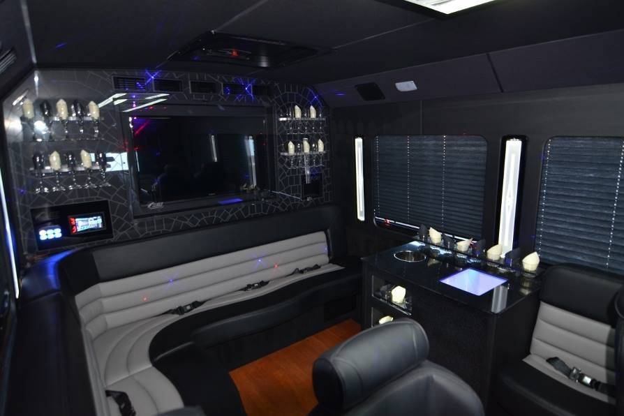 Luxury Limo Hawaii's brand new 2015 15-passenger limobus is the perfect size to fit your wedding party.  A flat screen tv and champagne flutes adorn the rear of the bus with an L-shaped booth seating five guests comfortably.