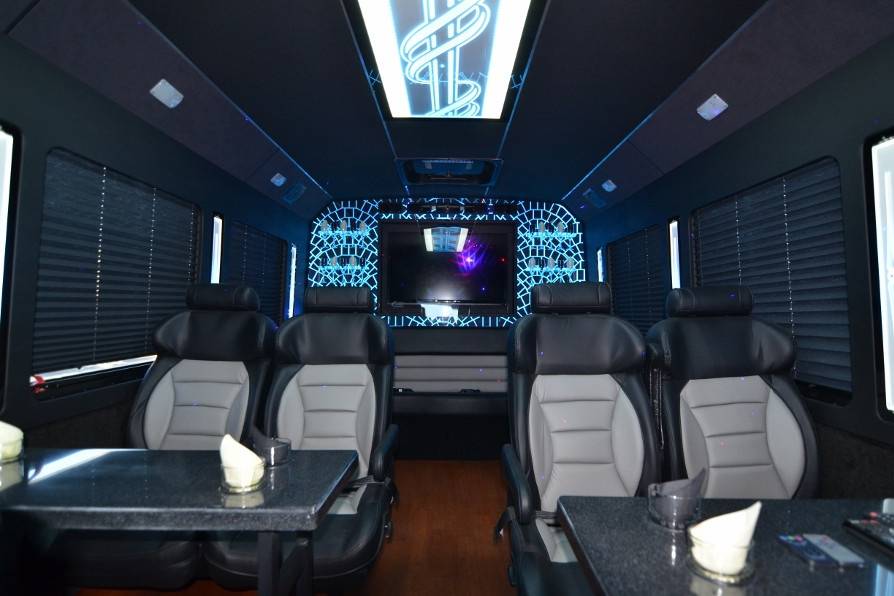 The 15-passenger bus has a laser light show with a flat-screen tv in the rear embellished with colorful lights and champagne flutes. Your view as you board the limobus: two tables, each with built-in glass holders and four luxurious captain seats.  Luxury Limo Hawaii is changing the game of limo service island-wide.