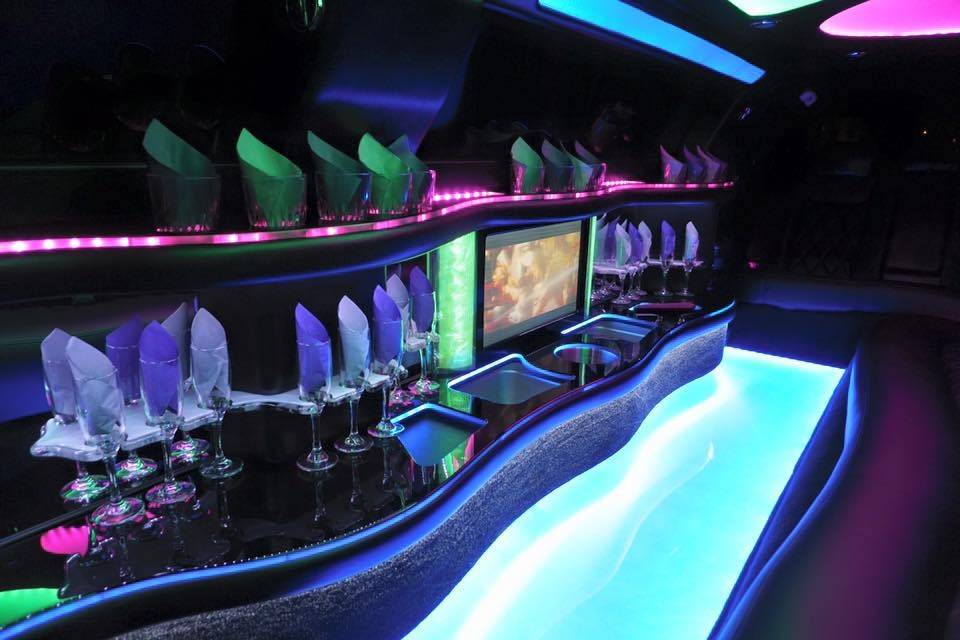 Yes, the floor is lit!  Champagne? Johnny Walker on the rocks?  We have enough glassware in our brand new Chrysler 300 stretch limo for everyone to have two glasses in their hands.