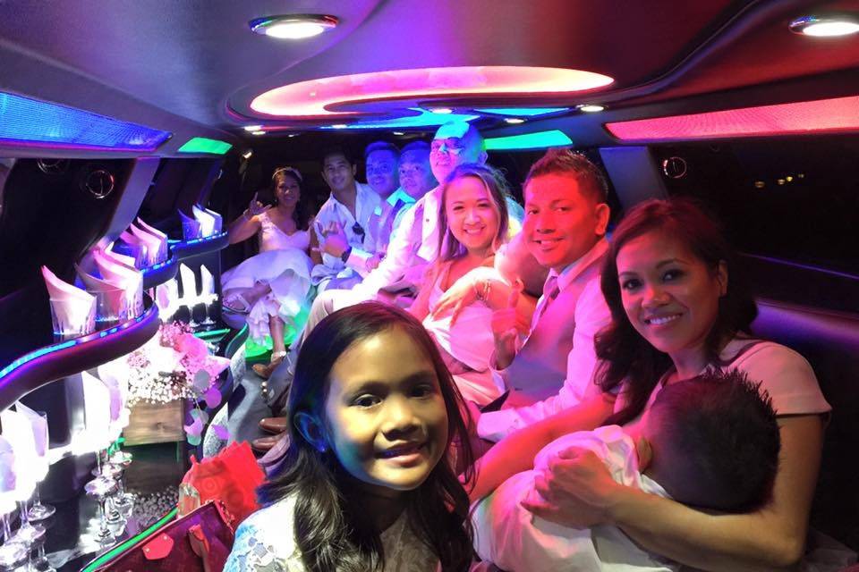 A stretch limo that's big enough to fit the bride, groom, and the whole family!  Many options for your big day!