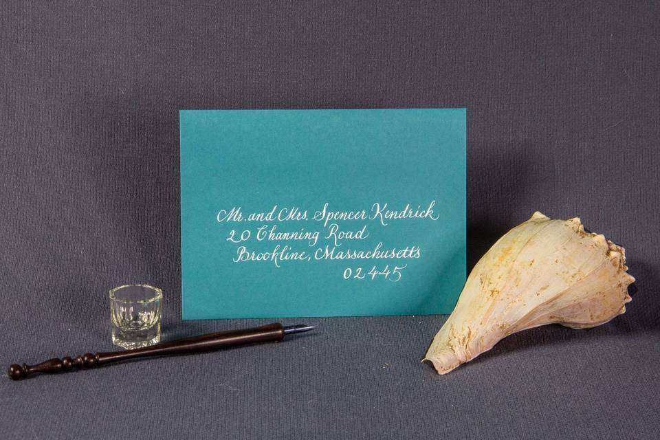 Teal paper white text