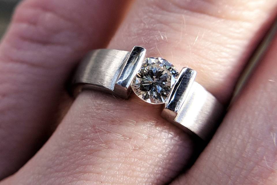 modern engagement ring with 1/2 ct diamond and white gold by Secrète Fine Jewelry in Bethesda, MD and Washington, DC