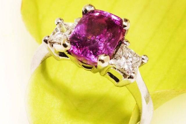 pink sapphire and diamond three stone engagement ring custom designed and handmade by Secrète Fine Jewelry in Bethesda, MD and Washington, DC