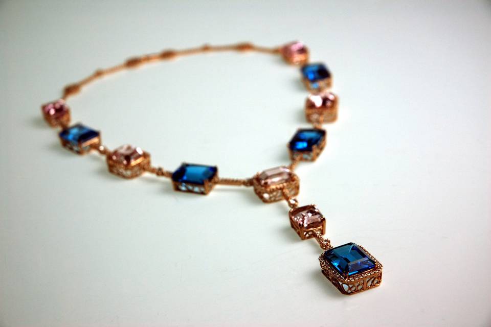 London blue topaz, kunzite, diamond, and rose gold necklace by Secrète Fine Jewelry in Bethesda, MD and Washington, DC