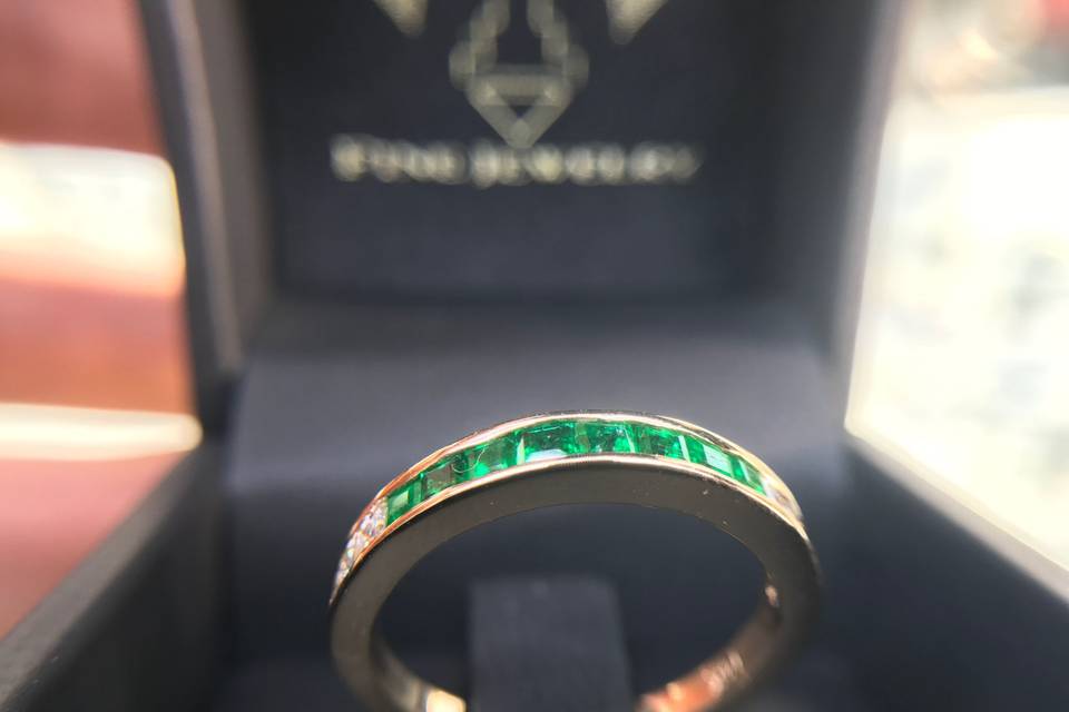 custom mens' wedding band with emeralds and diamonds by Secrète Fine Jewelry in Bethesda, MD and Washington, DC