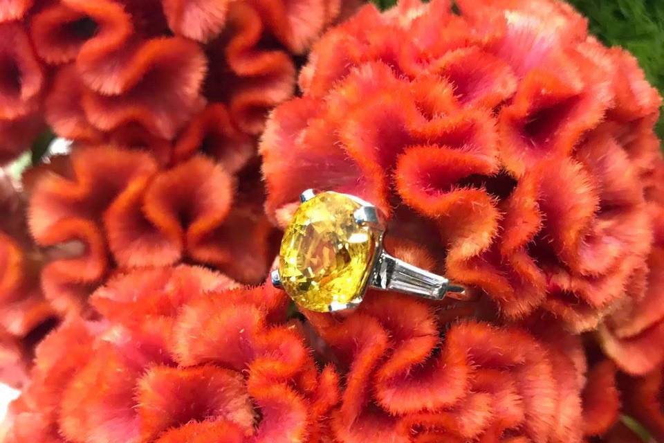 Yellow diamond and tapered baguette engagement ring  Secrète Fine Jewelry in Bethesda, MD and Washington, DC