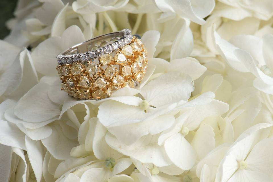 Fancy canary yellow diamond cluster wedding band by Secrète Fine Jewelry in Bethesda, MD and Washington, DC