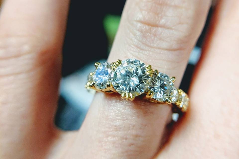 9-stone diamond ring by  Secrète Fine Jewelry in Bethesda, MD and Washington, DC