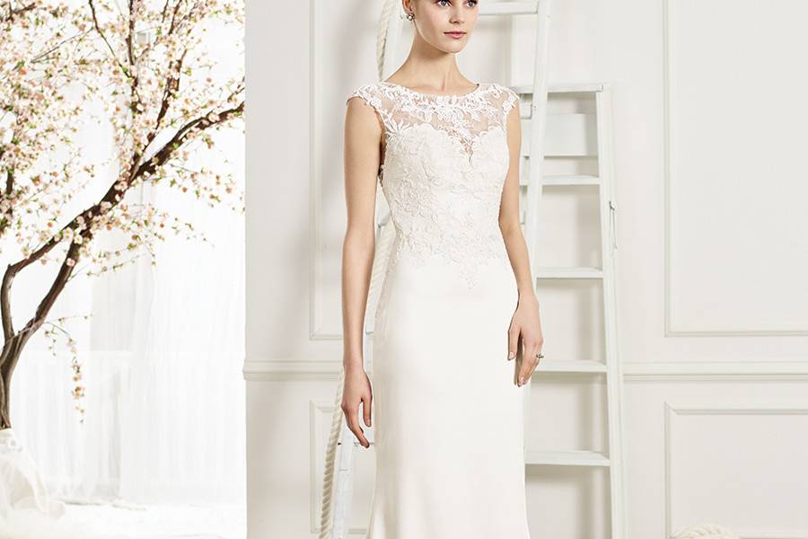Style BL202 Hope  A soft tulle ballgown with beaded lace appliques, a bateau neckline and a sheer illusion back.