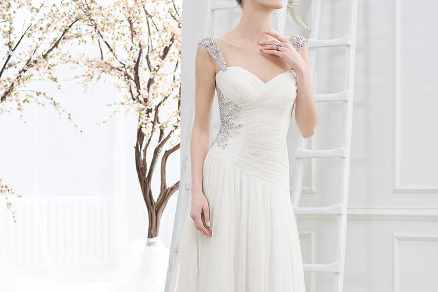 Style BL211 Reflection  A sweet and sassy Fit and Flare gown with sweetheart neckline, beaded lace on a bodice with exposed boning and a beautifully simple skirt.