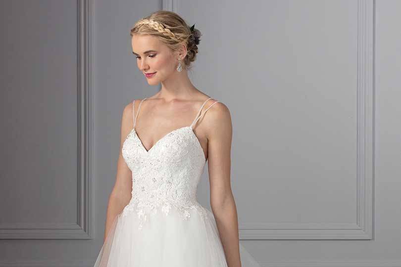 crystal and rhinestone beaded trim around the lower hip and matching Silk Shantung buttons along the back of the bodice.