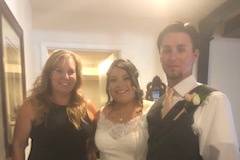 Officiant with the newlyweds