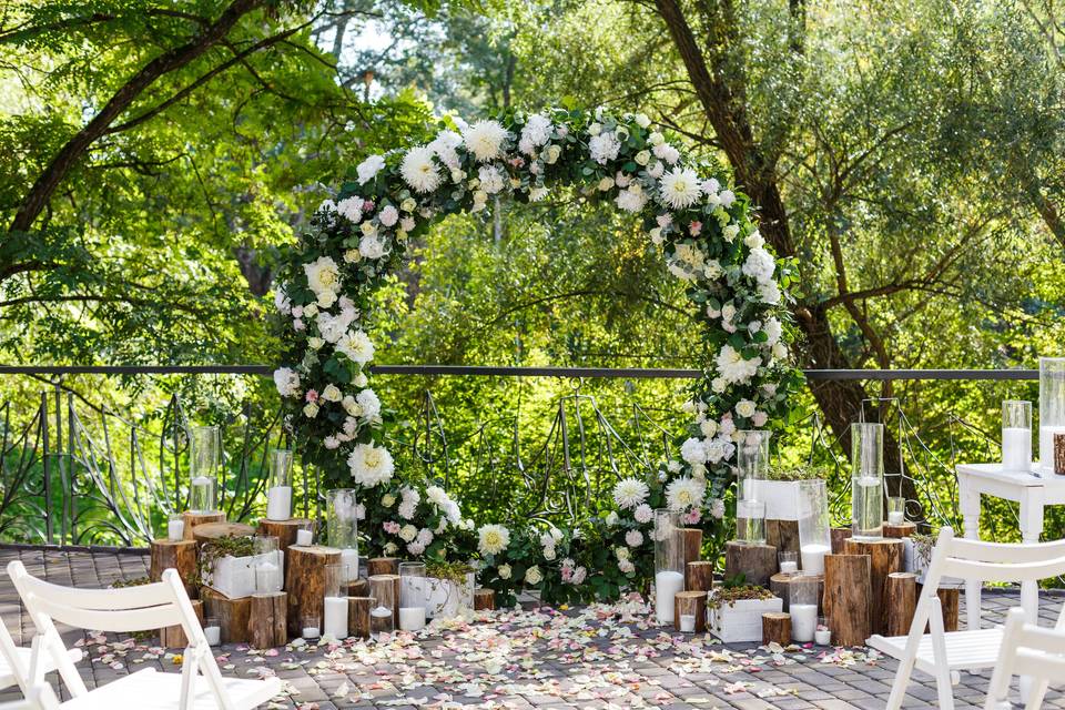 Wedding ceremony arch flowers