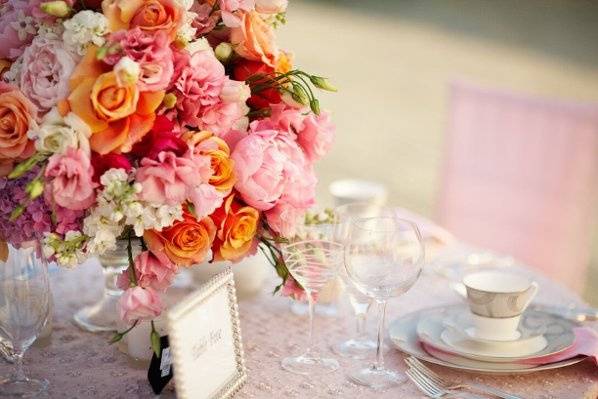Combination of Pink & Orange using Peonies, Garden Roses, Ranunculas & Hydrangea.